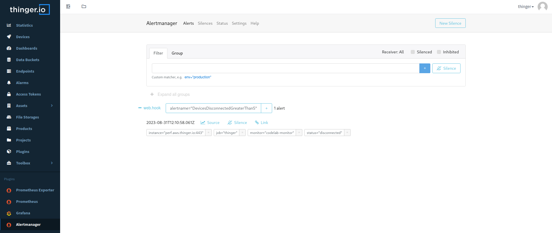 Alertmanager dashboard showcasing and alert over a metric devices disconnected greater than 5